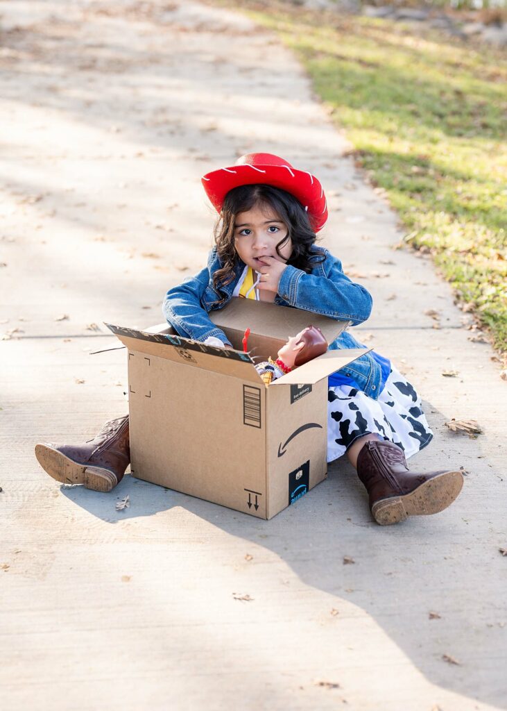 Little girl playing with toys posing idea