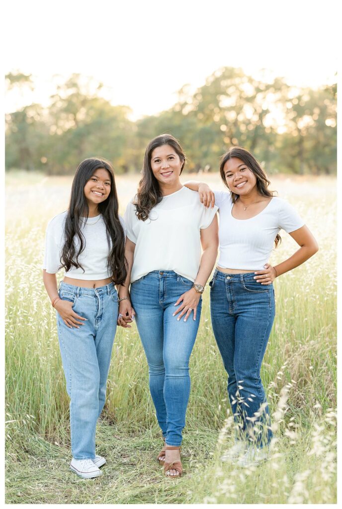 Mom and daughters posing idea during outdoor family photo session