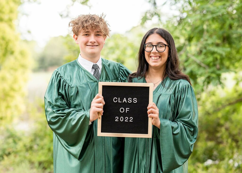 8th grade friends with a letter board during 8th grade graduation photoshoot