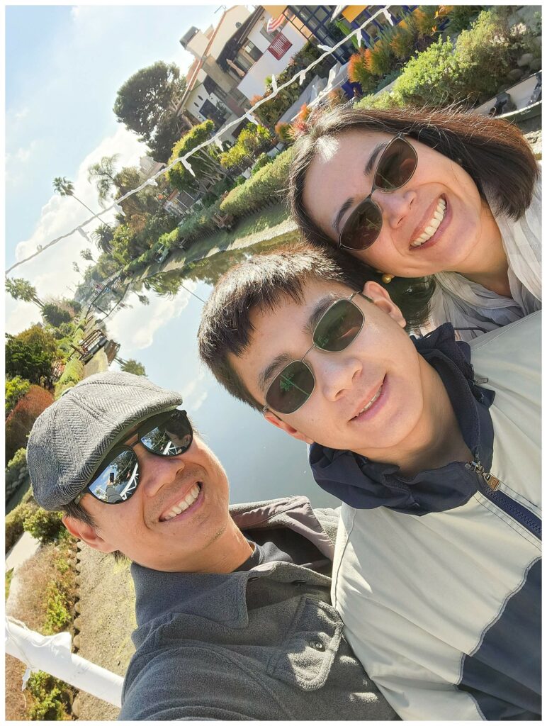 Family taking a selfie in Venice Beach Canals